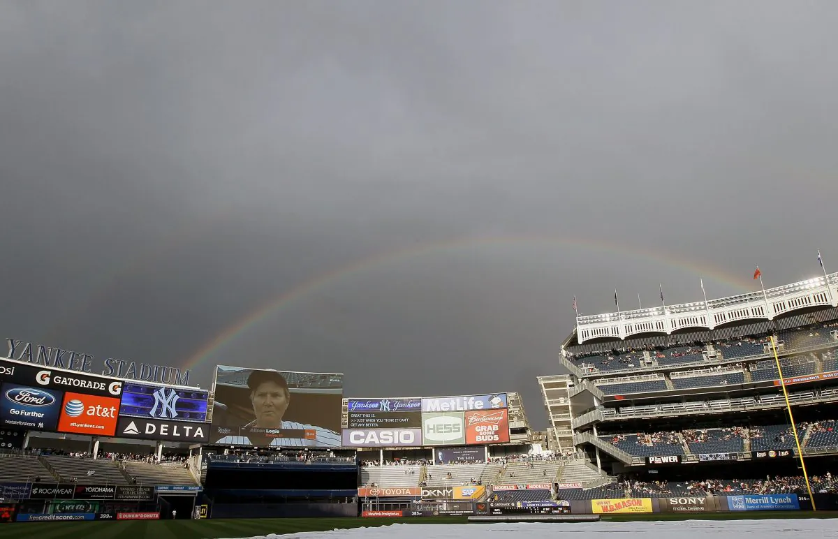 A rainbow is seen over Yankee Stadium during a rain delay before the game against the Tampa Bay Rays on June 7, 2012 in the Bronx borough of New York City. (Jim McIsaac/Getty Images)
