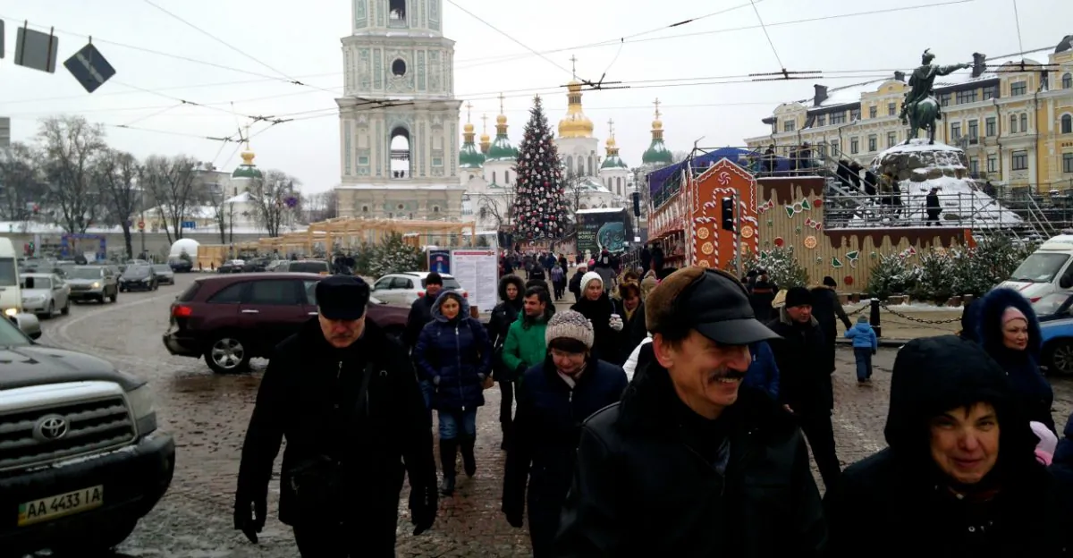 Shoppers crowd an outdoor Christmas market in Kyiv. (Nolan Peterson/The Daily Signal)