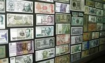 Around the World in 80 Payments—Global Moves to a Cashless Economy
