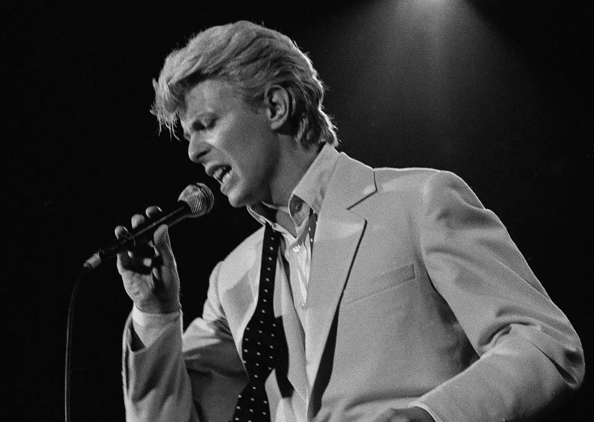 Rock superstar David Bowie, making his first musical performance in America in half a decade, performs on stage at the U.S. Festival on May 31, 1983 at Glen Helen Regional Park in Devore, Calif. (AP Photo/stf/Lennox McLendon)