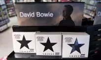 Bowie Smiling in Photo Shoot Released Two Days Before His Death