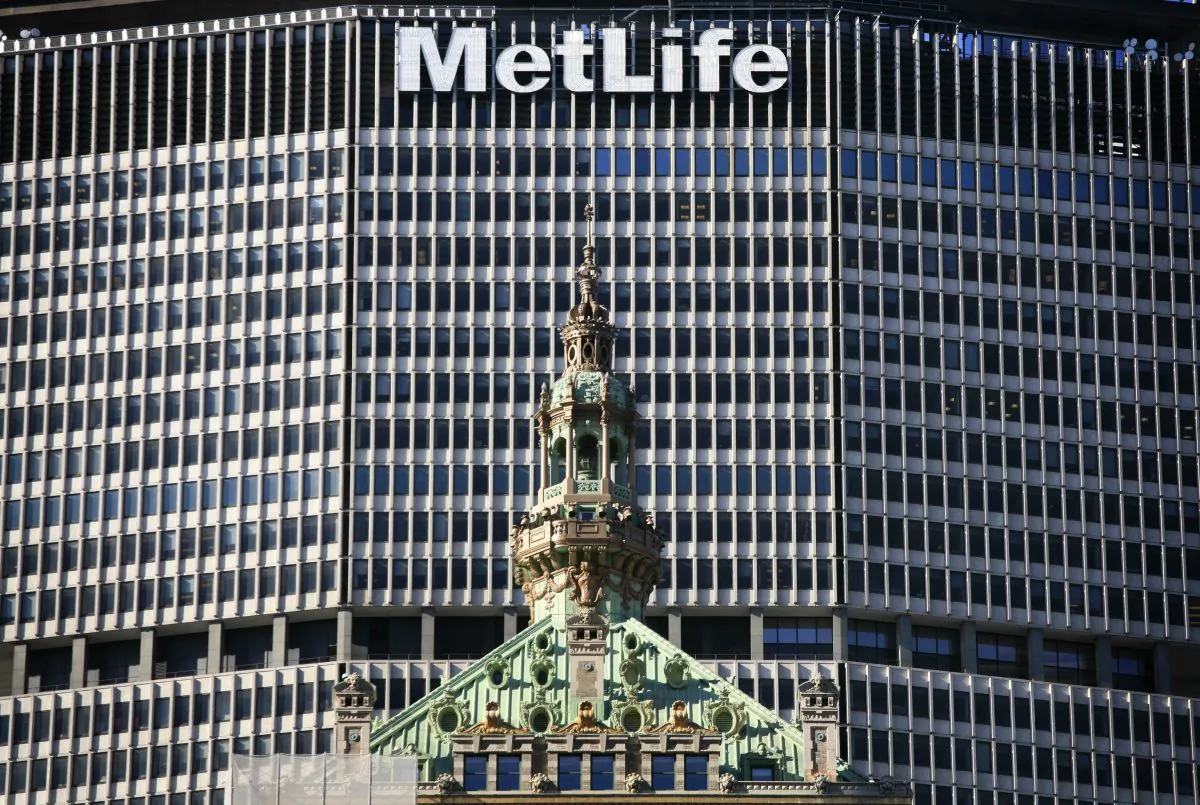 The MetLife skyscraper overlooks an older building in New York on April 16, 2009. (Mark Lennihan/AP Photo)