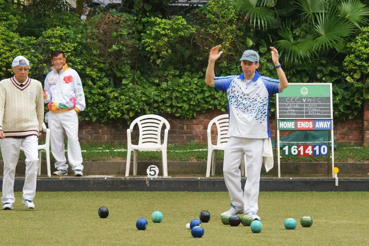 Hong Kong Football Club’s Neil Herrington (middle) shows his frustration during the Triples League match against Craigengower Cricket Club-A on Saturday Jan 9, 2016. Despite Herrington losing his match, the team return with a 4-4 draw and remain fifth on the table. (Mike Worth)