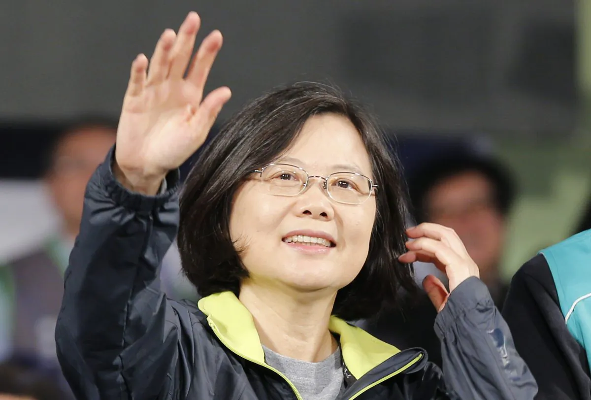 Democratic Progressive Party leader Tsai Ing-wen waves to supporters in Kaohsiung, Taiwan, on Jan. 9, 2016, a week before winning the presidential election. (AP Photo/Wally Santana)