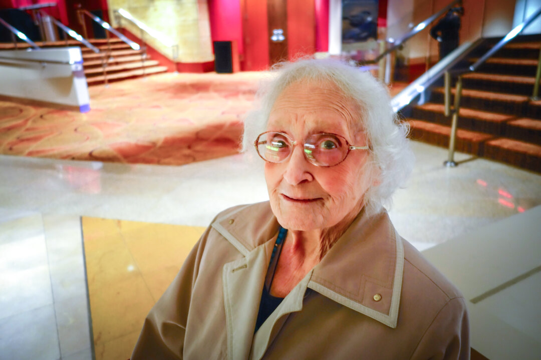 Mrs. Lila Stennett waits for her daughter after seeing Shen Yun opening night at Cobb Energy Centre in Atlanta on Jan.15, 2016. (Mary Silver/Epoch Times)