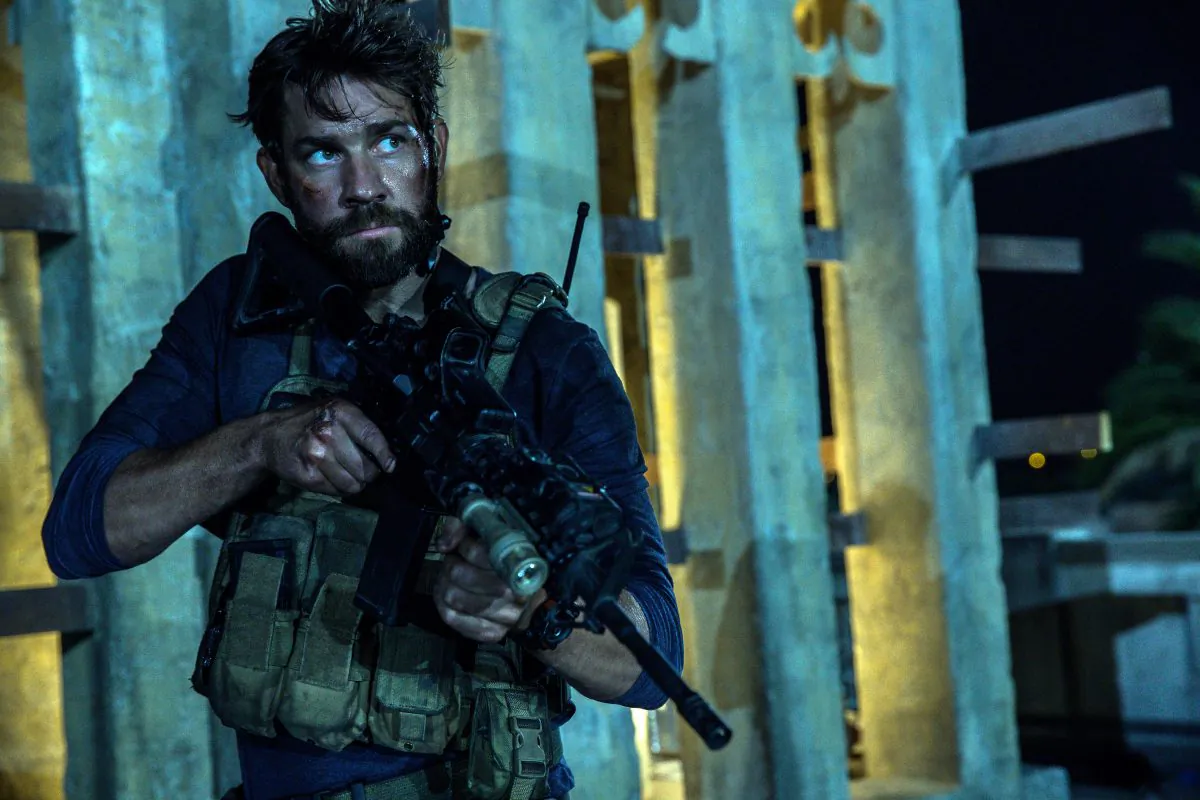 In this photo provided by Paramount Pictures shows John Krasinski as Jack Silva in the film, "13 Hours: The Secret Soldiers of Benghazi" from Paramount Pictures and 3 Arts Entertainment/Bay Films. The movie releases in U.S. theaters Jan. 15, 2016. (Christian Black/Paramount Pictures via AP)