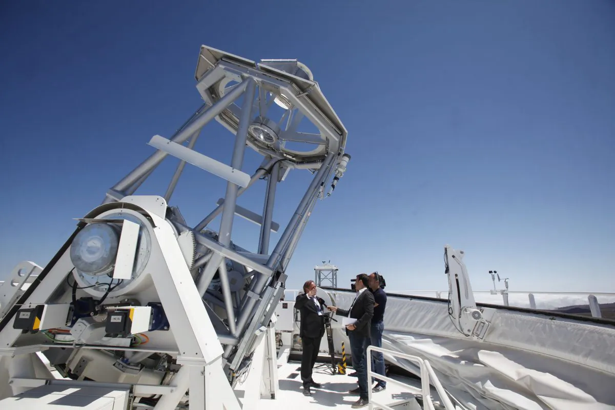Klaus Pushmann (L), one of the constructors of German Solar Telescope GREGOR, the biggest in Europe and third largest in the world, talks to journalists during its inauguration in the National Park of El Teide, on the Spanish Canary island of Tenerife, on May 21, 2012. (Desiree Martin/AFP/Getty Images)
