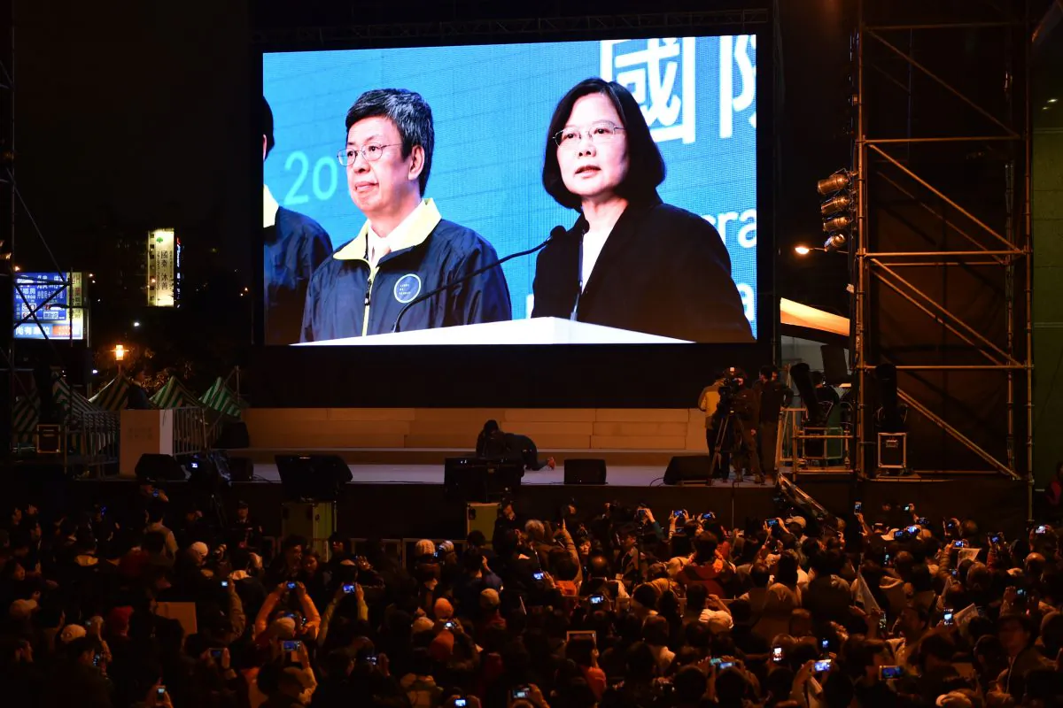 A giant screen showing a broadcast of Democratic Progressive Party (DPP) presidential candidate Tsai Ing-wen (R) is seen as supporters gather outside the party headquarters in Taipei on Jan. 16, 2016. Tsai Ing-wen of Taiwan's main opposition party was on course for a landslide election victory January 16, a win that would make her the island's first female president as voters turn their backs on closer China ties. (Sam Yeh/AFP/Getty Images)
