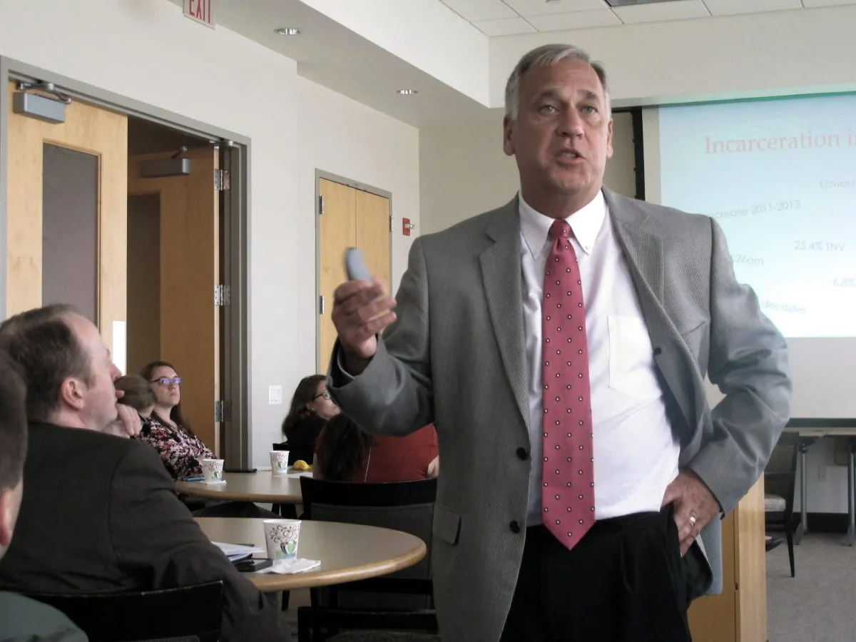 Gary Mohr, director of the Ohio Department of Rehabilitation and Correction, discusses efforts to reduce the state's prison population, in Columbus, Ohio, on Aug. 13, 2015. As states rethink the use of solitary confinement to punish unruly inmates, the American Correctional Association is reshaping national accreditation standards to ease such procedures. Mohr and Rick Raemisch, the Colorado prisons director, are developing the new American Correctional Association standards based on changes they’re pushing at home. (AP Photo/Andrew Welsh-Huggins)