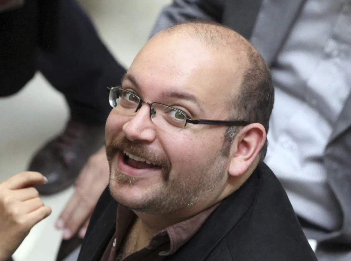 Jason Rezaian, an Iranian-American correspondent for the Washington Post, in a file photo,  April 11, 2013.  On Jan. 16, 2016, Rezaian was one of four dual-national prisoners freed by Iran's government and previously announced on Iranian state television without naming those released.  (AP Photo/Vahid Salemi, File)