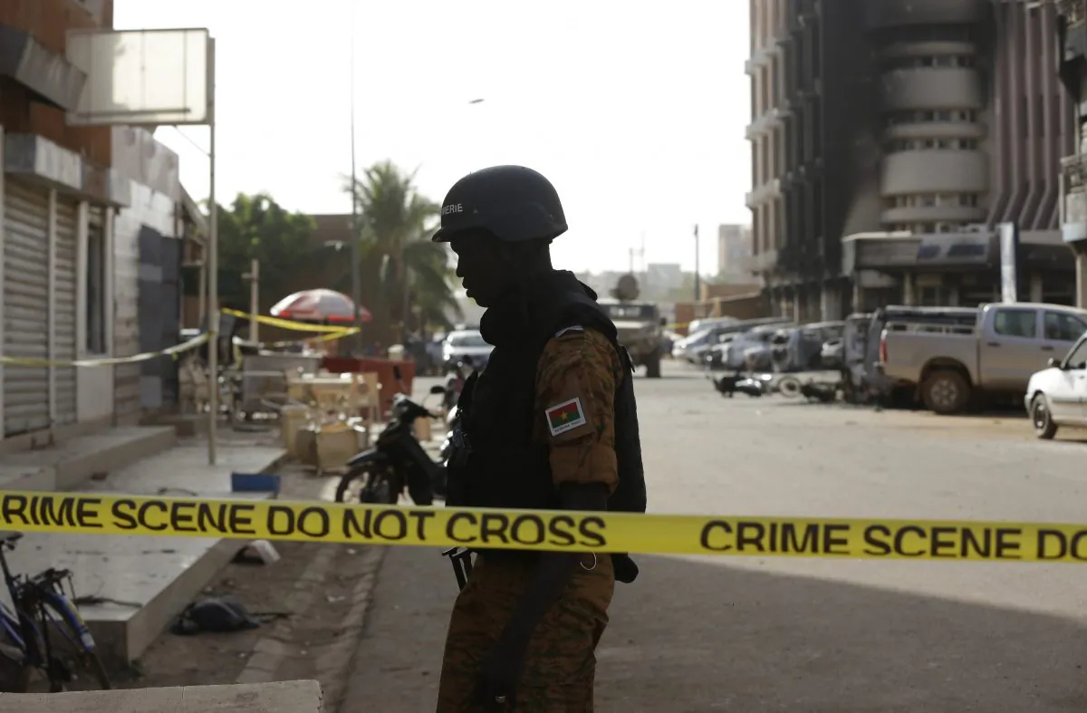 A soldier stand guard in Burkina Faso on Jan. 16, 2016. (Sunday Alamba/AP Photo)