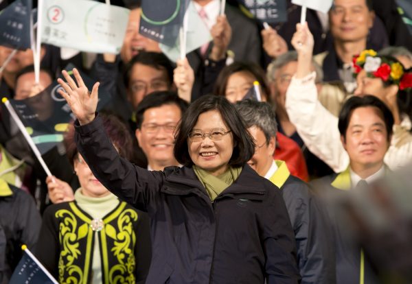President-elect Tsai Ying-wen waves to supporters at her Democratic Progressive Party (DPP) headquarter in Taipei, Taiwan, on Jan. 16, 2016. Tsai, the chairwoman of the opposition DPP, won the presidential election to become the Taiwan's first female leader. (Ashley Pon/Getty Images)