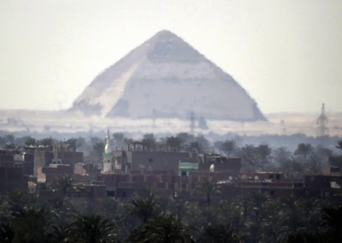 The 4,500-year-old Bent Pyramid is seen in Dahshour near Cairo, Egypt, on March 24, 2009. An international heritage research group says scientists will begin analyzing radiographic muons, or cosmic particles, collected from the ancient Bent Pyramid built by the Pharaoh Snefru. (AP Photo/Amr Nabil)