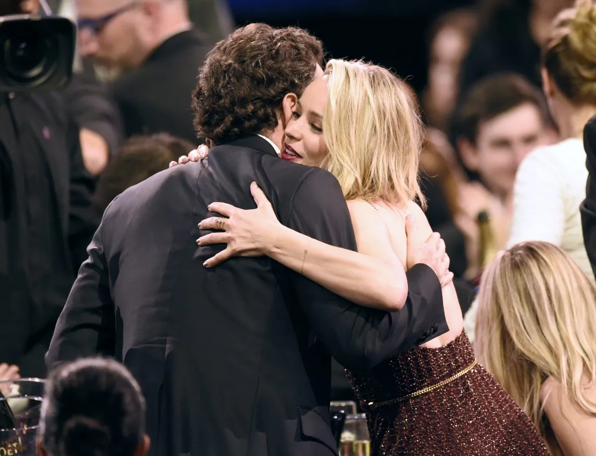 Brian d'Arcy James, left, hugs Rachel McAdams in the audience after hearing that they won the award for best picture for "Spotlight" at the 21st annual Critics' Choice Awards at the Barker Hangar on Sunday, Jan. 17, 2016, in Santa Monica, Calif. (Photo by Chris Pizzello/Invision/AP)