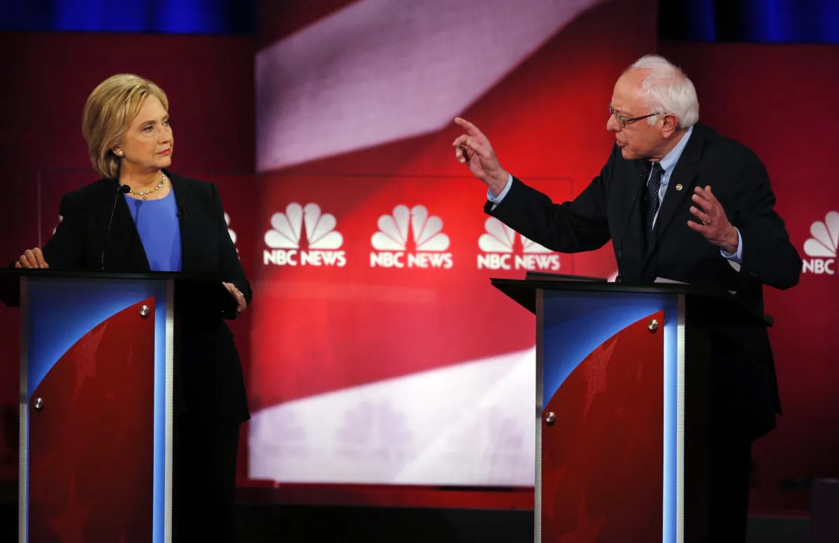 Democratic presidential candidates Sen. Bernie Sanders (I-Vt.) (R) and Hillary Clinton at the NBC, YouTube Democratic presidential debate at the Gaillard Center in Charleston, S.C., on Jan. 17, 2016. (AP Photo/Mic Smith)