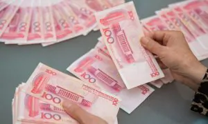 Will China Central Bank's Debt Bomb Blow Up the Yuan?