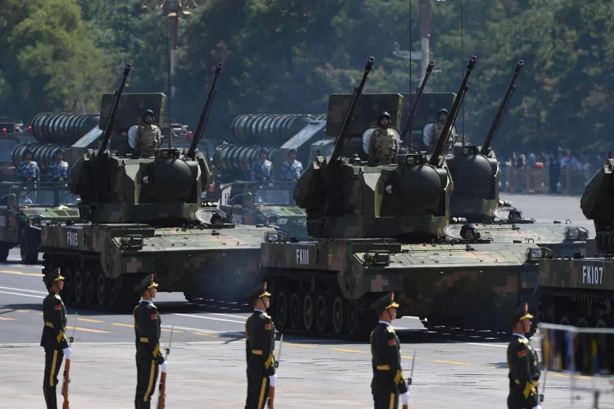 The Chinese military displays its equipment during a military parade at Tiananmen Square in Beijing on Sept. 3, 2015. Author and filmmaker Peter Navarro warns that China may be on the path to war. (Greg Baker/AFP/Getty Images)