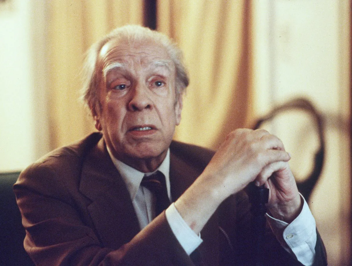 Argentina's writer Jorge Luis Borges talks in his Buenos Aires apartment on Nov. 20, 1981. (AP Photo/Eduardo Di Baia)