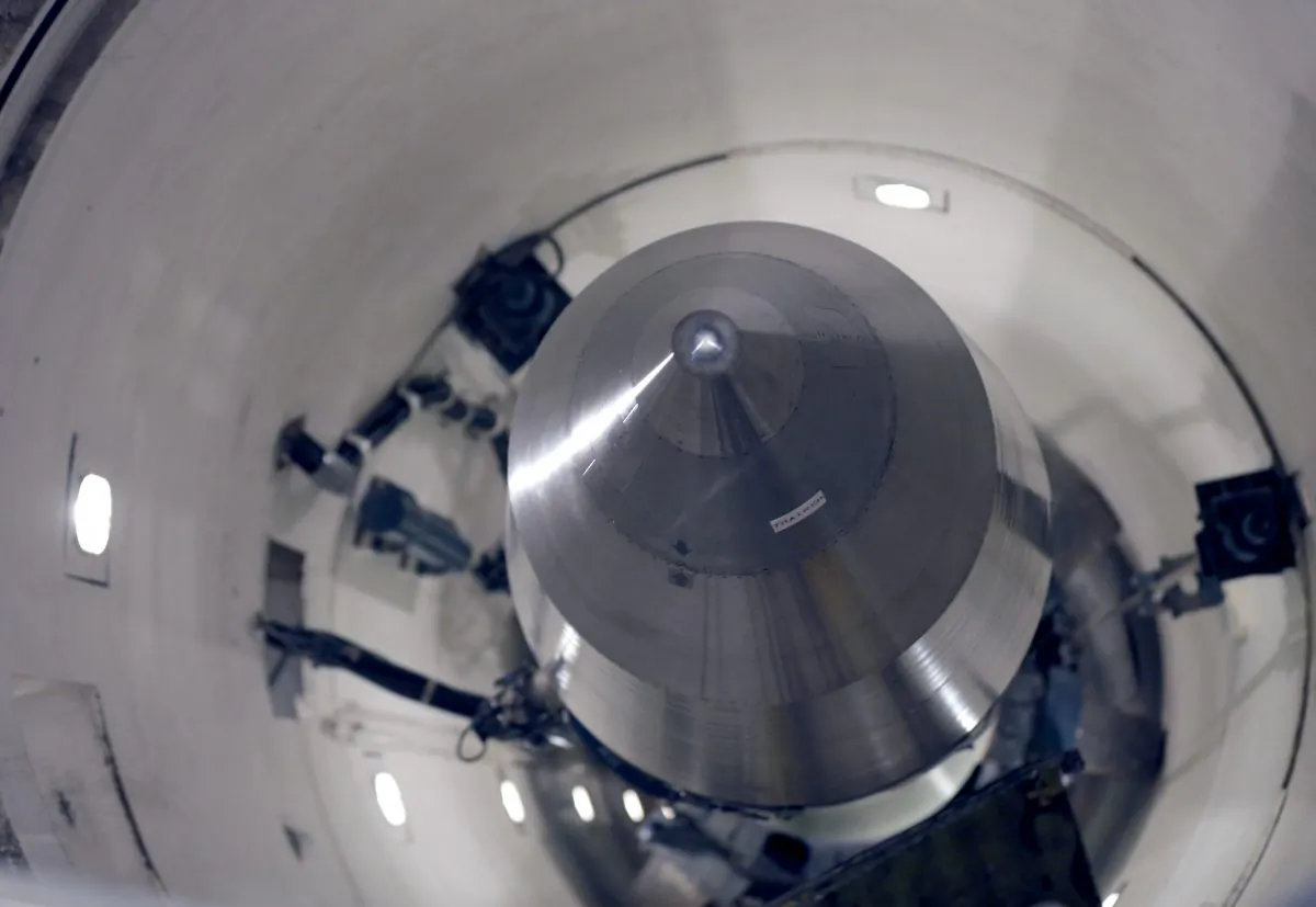 An inert Minuteman 3 missile is seen in a training launch tube at Minot Air Force Base, N.D., on June 25, 2014. (AP Photo/Charlie Riedel)
