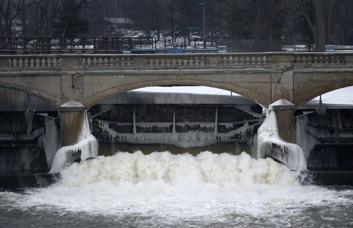The Flint River near downtown Flint, Mich., on Jan. 21, 2016. City leaders are floating a shockingly high price to replace the city's water infrastructure damaged after the state’s disastrous decision in 2014 to use the Flint River as the city’s drinking water source without adding a chemical to control corrosion, which caused high levels of chloride from the river to react with iron in the pipes, causing lead to leach into water for a year and a half and contributing to a spike in child lead poisoning before city and state officials fully acknowledged the problem. (AP Photo/Paul Sancya)