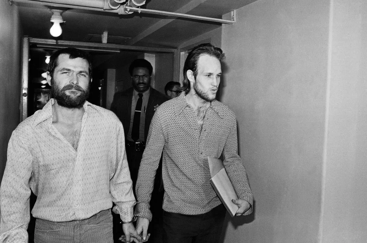 Charles Manson followers Bruce Davis (L) and Steve Grogan leaving court after a hearing in Los Angeles on Dec. 22, 1970. Gov. Jerry Brown has rejected parole for Davis a follower of cult leader Charles Manson 46 years after a series of bloody murders rocked Southern California, Friday, Jan. 22, 2016. Bruce Davis was convicted of the 1969 slayings of musician Gary Hinman and stuntman Donald "Shorty" Shea. He was not involved in the more notorious killings of actress Sharon Tate and six others. (AP Photo/Harold Filan)