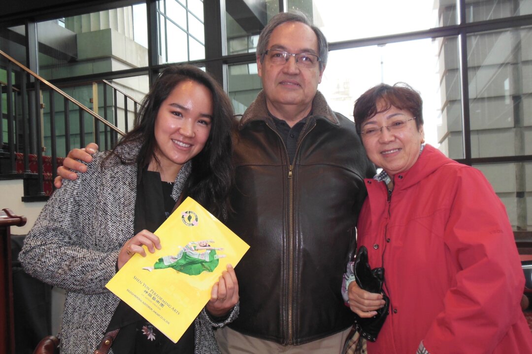 Julio Quinones (C) with Stacy Miller and his daughter enjoy Shen Yun Performing Arts at the Duke Energy Center for the Performing Arts on Jan. 23, 2016. (Sherry Dong/Epoch Times)