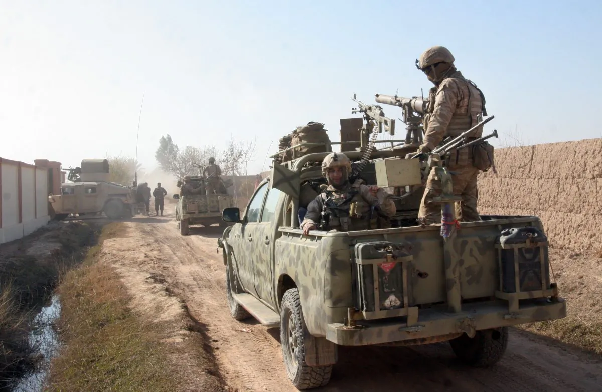 Afghan security forces patrol in Nad Ali District of Helmand Province, Afghanistan, on Dec. 22, 2015. (AP Photos/Abdul Khaliq)