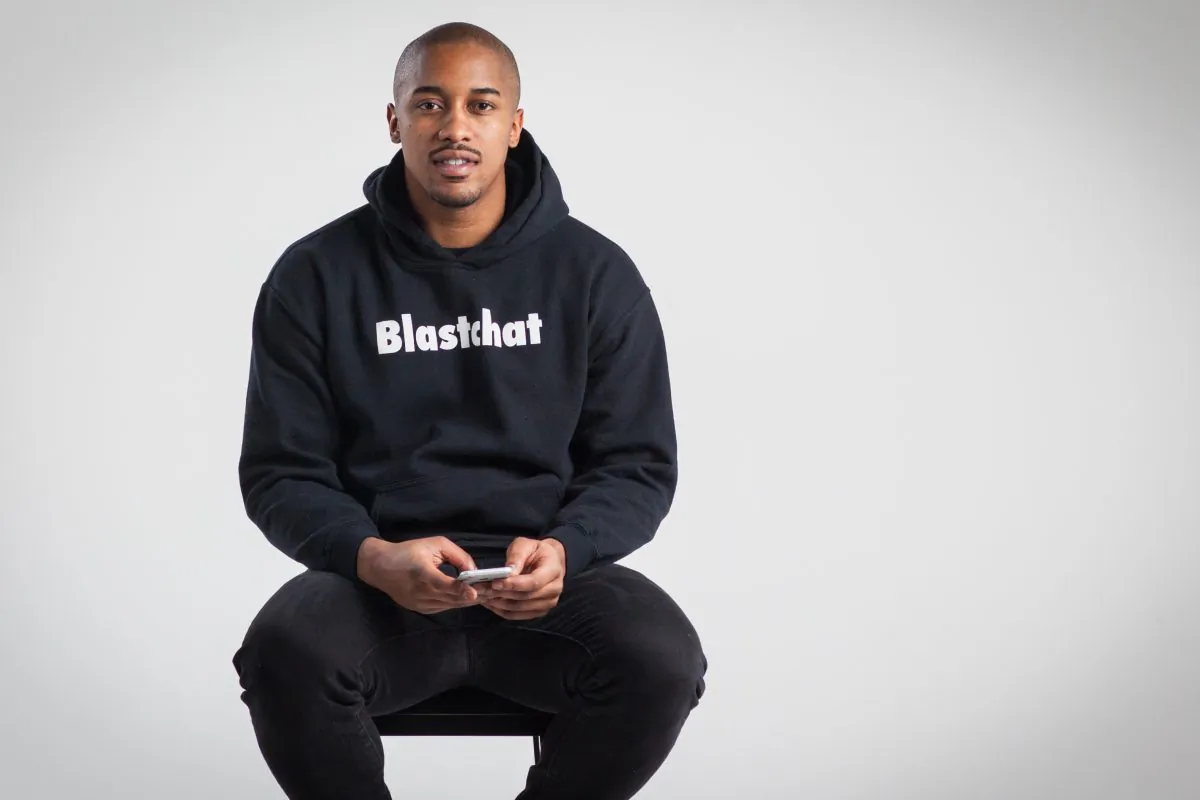 Jhamar Youngblood, creator of BlastChat, an app that allows users to send group messages but receive individual responses, has been inspiring young African Americans to learn computer science. (Benjamin Chasteen/Epoch Times)