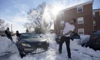 Slow Return to Normal Routines for Cities Hit by Snowstorm