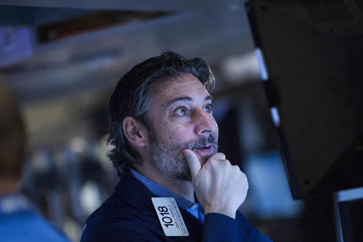 A trader works on the floor of the New York Stock Exchange on Jan. 26, 2016. (Andrew Burton/Getty Images)