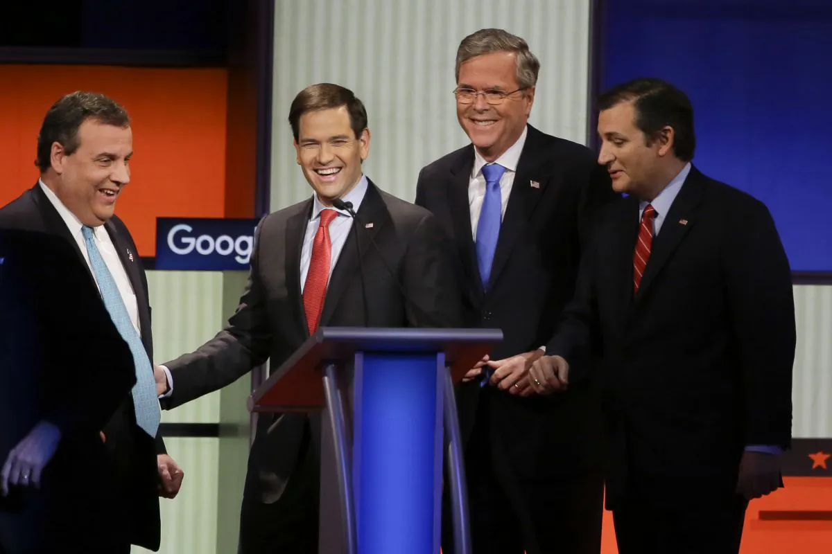 Republican presidential candidates (L-R) New Jersey Gov. Chris Christie, Sen. Marco Rubio, R-Fla., former Florida Gov. Jeb Bush and Sen. Ted Cruz, R-Texas, talk after the Republican presidential primary debate, Thursday, Jan. 28, 2016, in Des Moines, Iowa. (AP Photo/Charlie Neibergall)