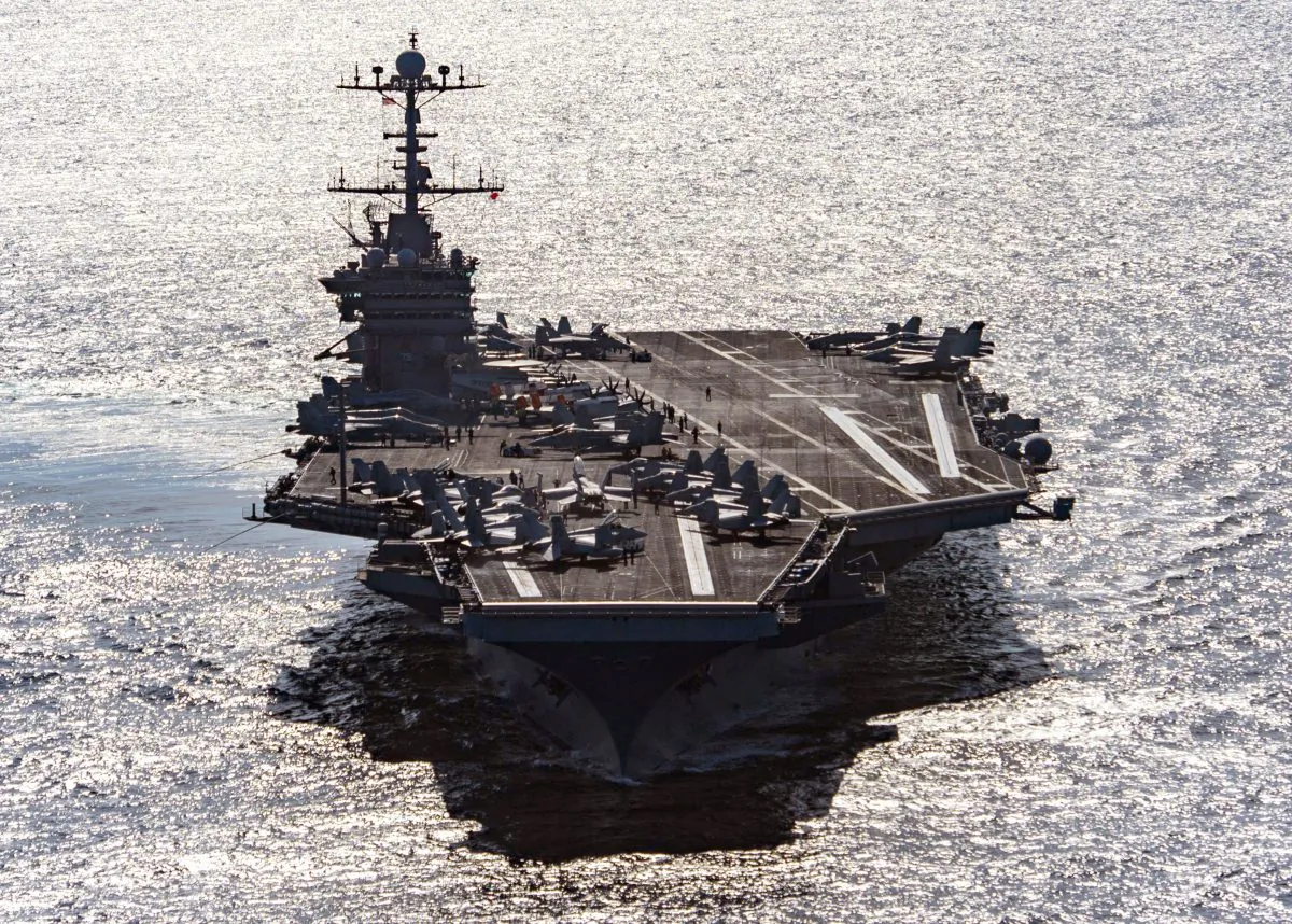 In this Friday, Dec. 25, 2015 photo released by the U.S. Navy, the aircraft carrier USS Harry S. Truman navigates the Gulf of Oman. (Mass Communication Specialist 3rd Class J. M. Tolbert/ U.S. Navy via AP)