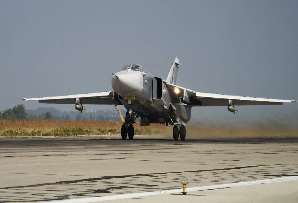 A Russian Su-24 takes off on a combat mission at Hemeimeem airbase in Syria on Oct. 22, 2015. (Vladimir Isachenkov/AP Photo)