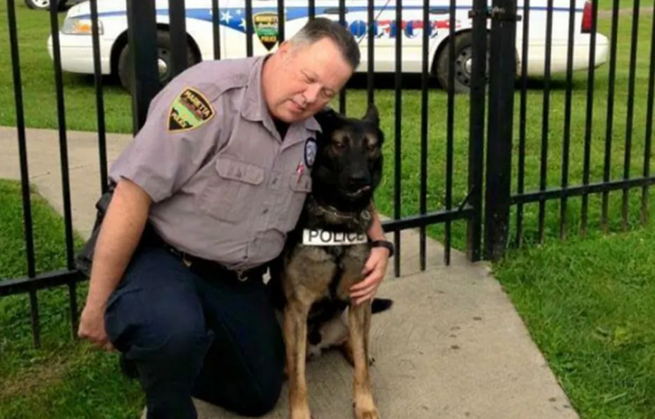 Retired Officer Matthew Hickey with Ajax, his K-9 partner he wants to retire with him. (Screenshot/GoFundMe)