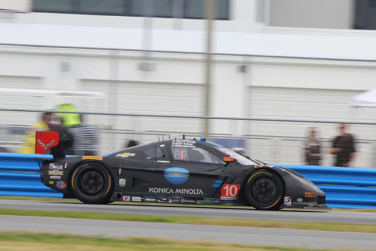 Ricky Taylor in the #10 WTR Dallara-Corvette leads the race but Pipo Derani in the #2 ESM Ligier-Honda is closing fast. (Chris Jasurek/Epoch Times)