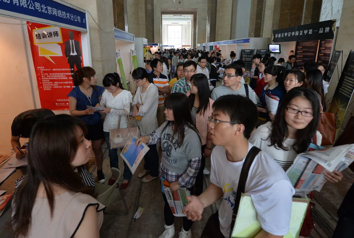 Chinese jobseekers attend a jobs fair in Beijing on May 18, 2013. (Mark Ralston/AFP/Getty Images)