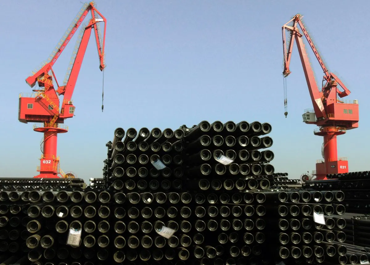 Steel pipes at a port in Lianyungang, eastern China's Jiangsu province, are being loaded for export on Dec. 1, 2015. (STR/AFP/Getty Images)