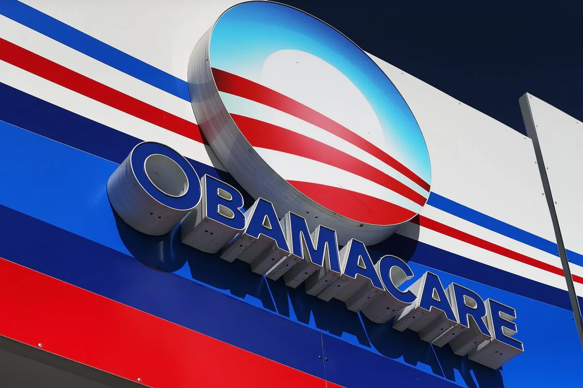 An Obamacare sign is seen on the UniVista Insurance company office in Miami on Dec. 15, 2015. (Joe Raedle/Getty Images)