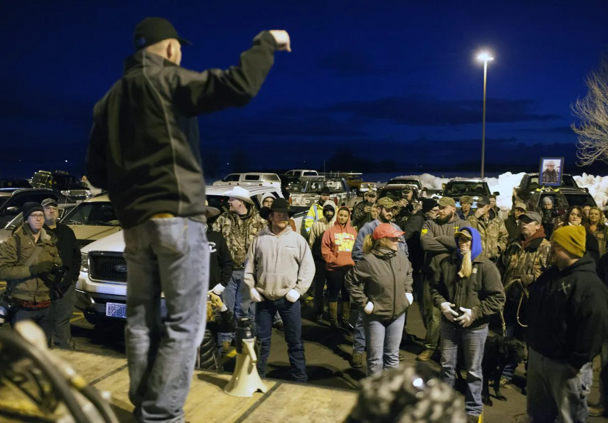 Anti-government protesters gather during a rally prior to a rolling vehicle protest by self-proclaimed patriots in Burns, Ore., on Jan. 30, 2016. (Matt Mills McKnight/Getty Images)