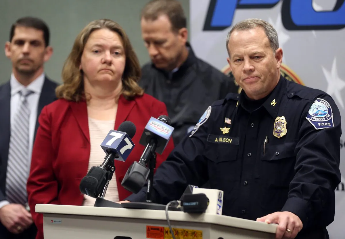 Montgomery County Commonwealth's Attorney Mary Pettitt (L) and Blacksburg Police Chief Anthony Wilson listen to questions during a news conference in Blacksburg Va., on Jan. 30, 2016. (Matt Gentry/The Roanoke Times via AP)
