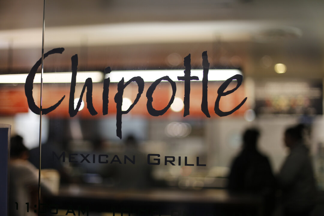 A Chipotle restaurant in Union Station in Washington, D.C., on Dec. 27, 2015. The Centers for Disease Control and Prevention (CDC) said Monday, Feb. 1, 2016, that the E. coli outbreak at Chipotle restaurants appears to be over, and that they are closing the investigation. (AP Photo/Gene J. Puskar)