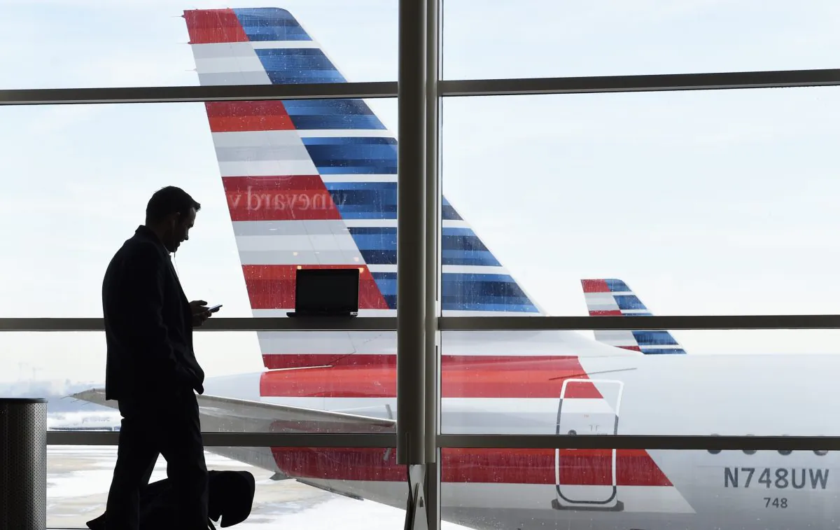 An American Airlines jet parked at the Washington's Ronald Reagan National Airport, on Jan. 25, 2016. (AP Photo/Susan Walsh)
