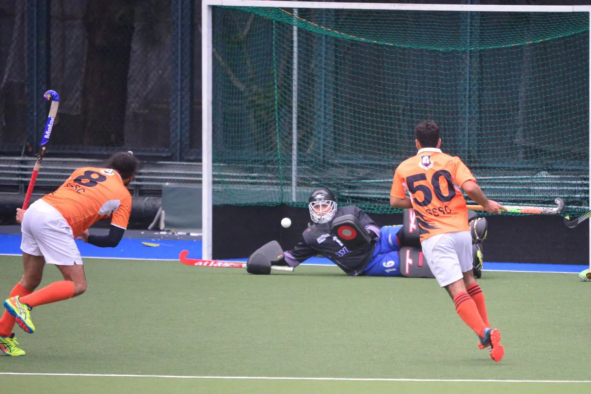 SSSC's Satwinder Singh launches a strike only to have Khalsa goalkeeper Aiden Ibrahim diving to deny him in their HKHA Premier-A match at King’s Park on Sunday Jan 31, 2019. (Eddie So)
