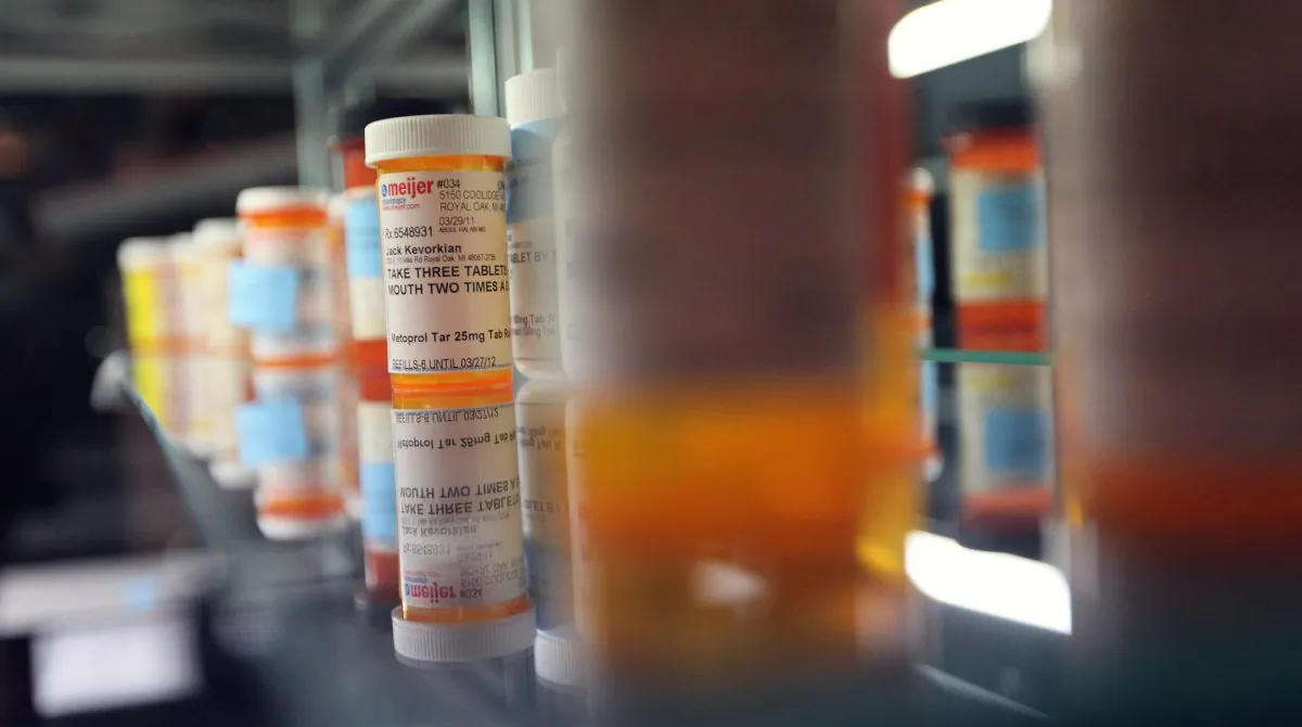Pill bottles are displayed in this file photo. (Mario Tama/Getty Images)