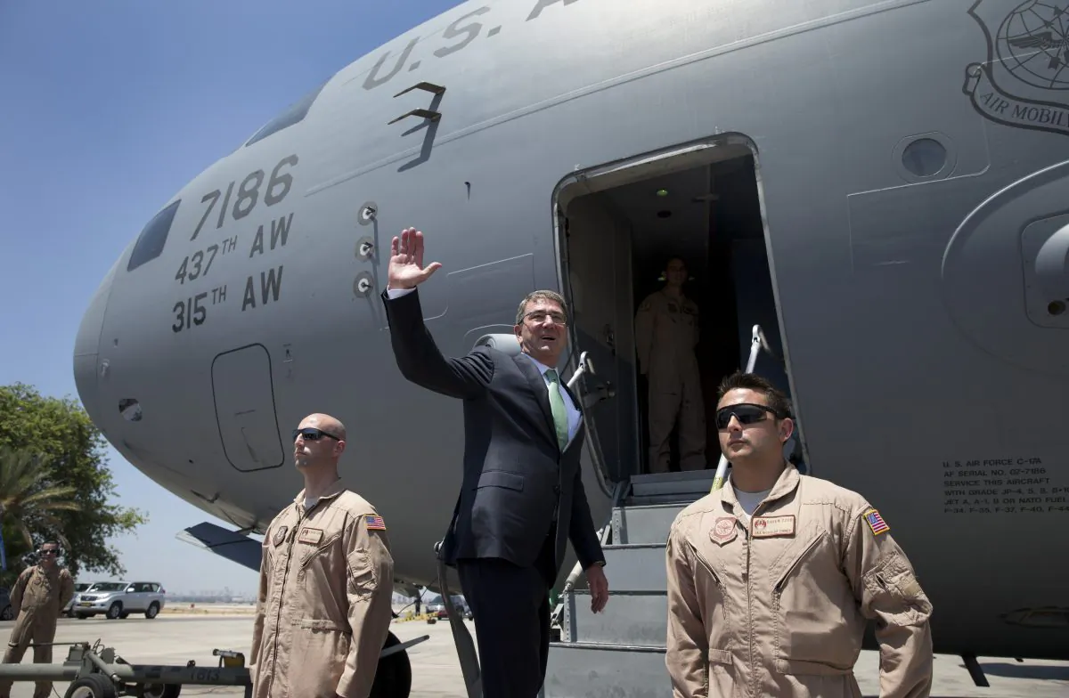 U.S. Defense Secretary Ash Carter boards a C-17 military aircraft at Ben Gurion International Airport in Tel Aviv, Israel, on July 21, 2015. (Carolyn Kaster/Getty Images)