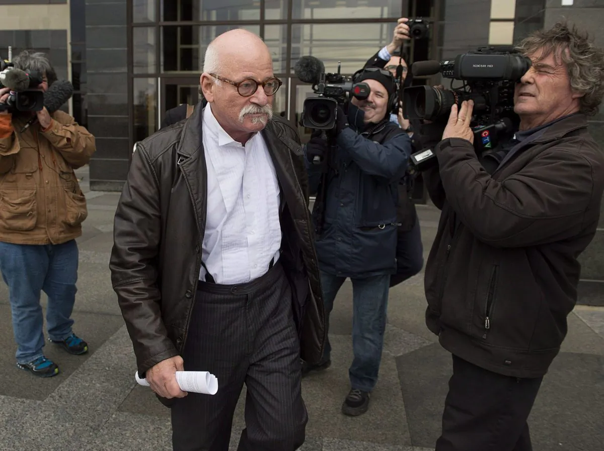 David Lutz, lawyer for Justin Bourque, leaves Moncton Law Courts on Oct. 27, 2014. Bourque used a semi-automatic rifle to kill three RCMP officers and wound two others. Ron Davis, whose daughter was gunned down in a robbery, wants a renewed debate on firearm control and the federal long-gun registry. (THE CANADIAN PRESS/Andrew Vaughan)