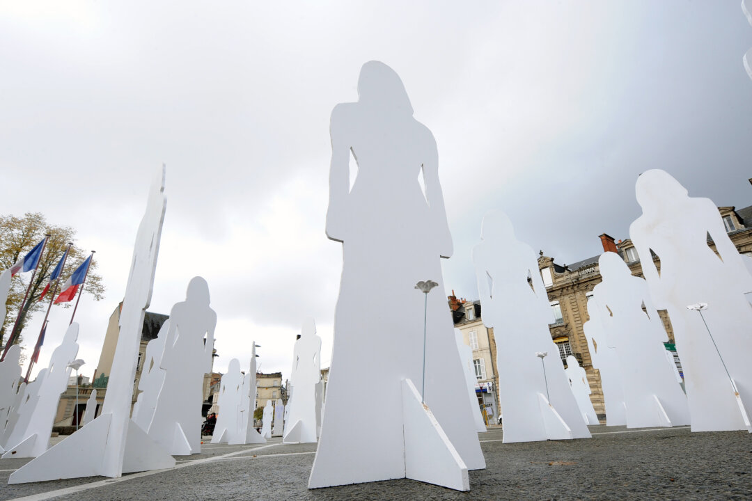 166 silhouettes represent French women victims of violence in 2007 as part of the International Day for the Elimination of Violence Against Women, in Le Mans, on Nov. 25, 2010. (Jean-Francois Monier/AFP/Getty Images)
