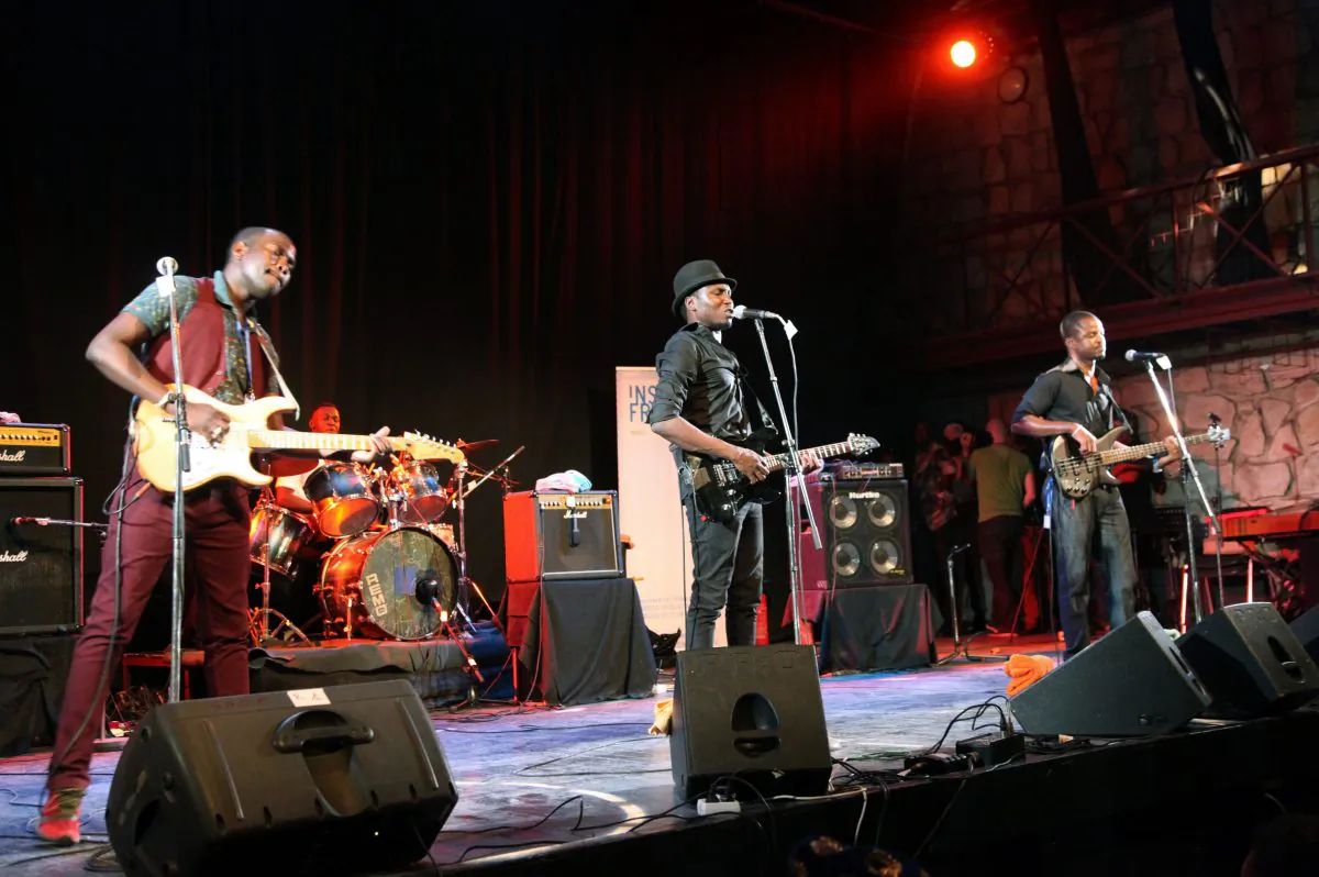 Malian band Songhoy Blues performs at the Bamako Acoustik Festival (BAF) in Bamako on on Jan. 27, 2016. BAF hosts African and International artists as Damon Albarn, Tony Allen, Songhoy Blues, Cheikh Tidiane Seck, and dreams of a cultural revival despite a state of emergency instaured after the Nov. 20 deadly terror attack in an hotel. (Sebastien Rieussec/AFP/Getty Images)