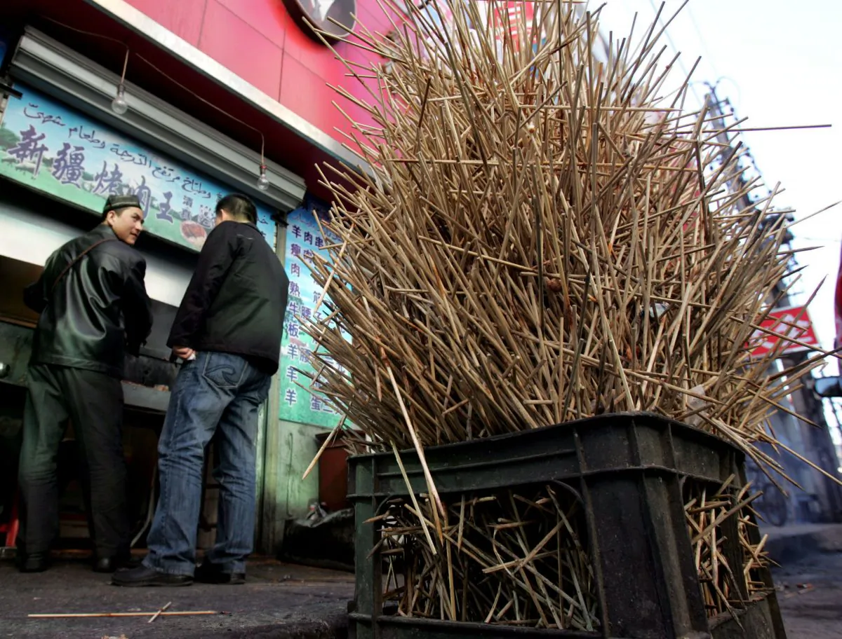 Used wooden chopsticks at a roasted mutton stall on a street on March 23, 2006 in Changchun of Jilin Province, China. (China Photos/Getty Images)