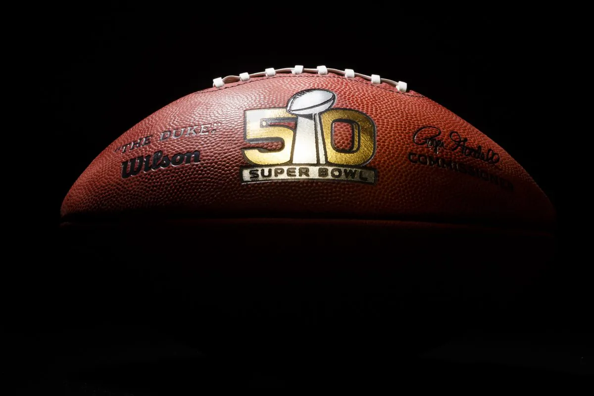An official game ball for the NFL Super Bowl 50 football game is photographed on Jan. 26, 2016. The Wilson Sporting Goods football factory in Ada, Ohio has made the official Super Bowl football since the first Super Bowl in 1966. The company began making this year's game balls last Sunday night, Jan. 24, immediately after the conclusion of the NFC and AFC championship games. The Denver Broncos will play the Carolina Panthers in the Super Bowl on Feb. 7, in Santa Clara, Calif. (AP Photo/Rick Osentoski)